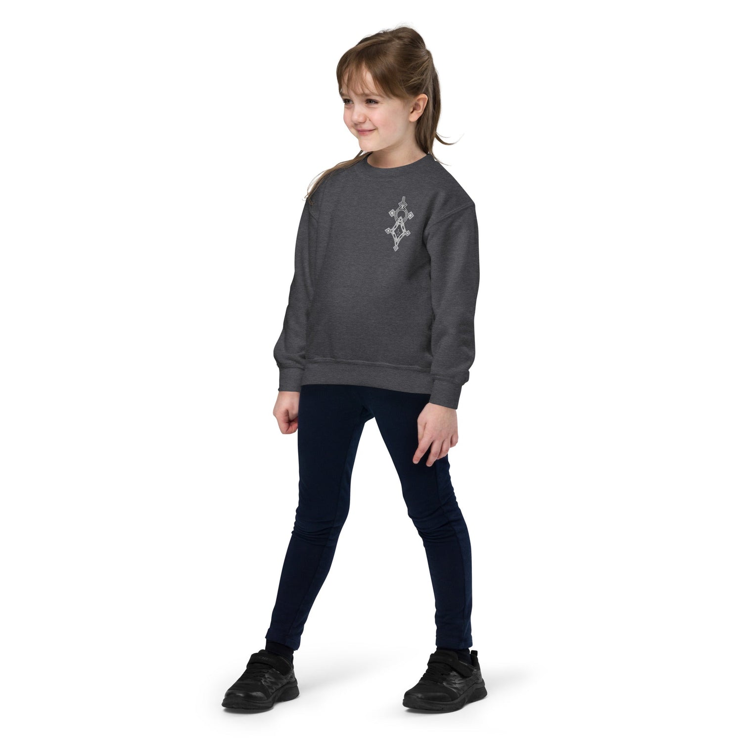Youth crewneck sweatshirt in dark gray fleece worn by child with embroidered design on chest