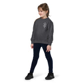 Youth crewneck sweatshirt in dark gray fleece worn by child with embroidered design on chest
