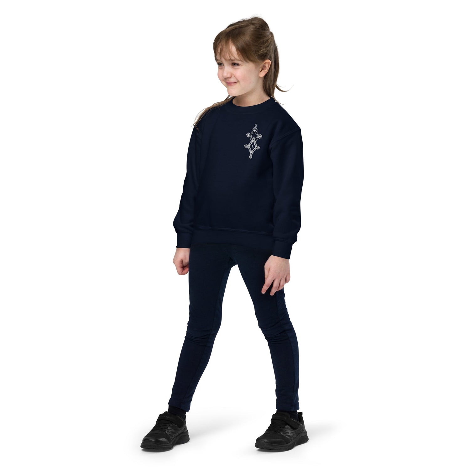 Youth crewneck sweatshirt in navy blue fleece worn by child with printed design on chest