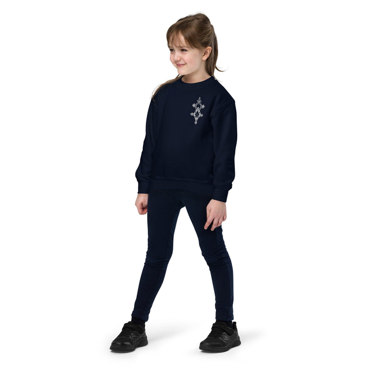 Youth crewneck sweatshirt in navy blue fleece worn by child with printed design on chest