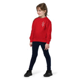 Child wearing red youth crewneck sweatshirt with graphic design and dark pants
