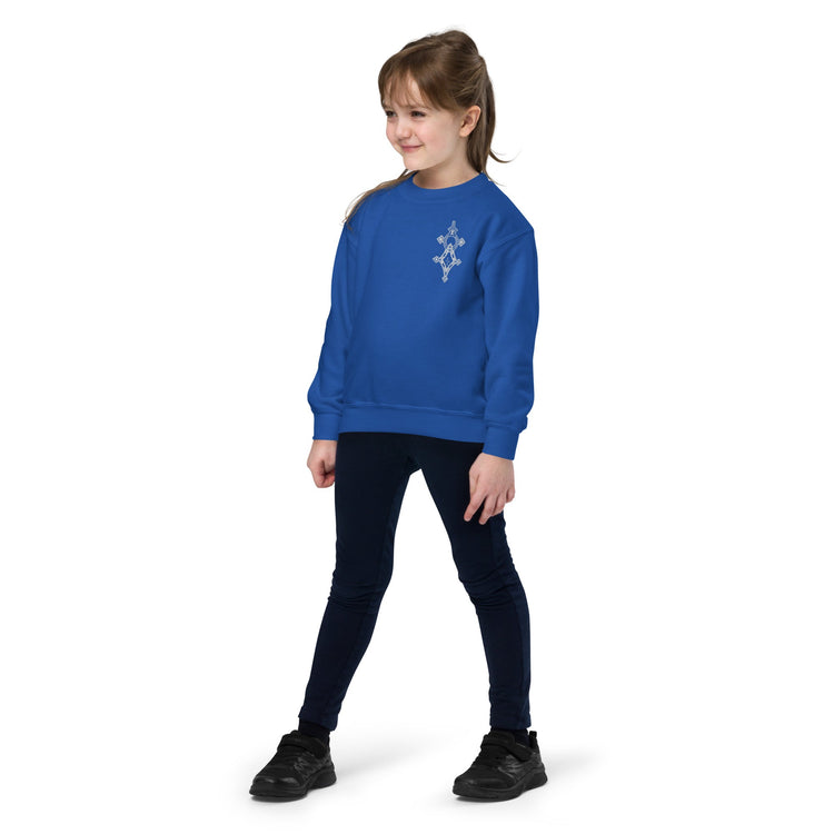 Youth crewneck sweatshirt in blue fleece worn by child with graphic design on chest