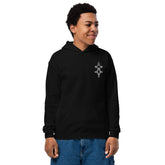Youth heavy blend hoodie black with double-lined hood and front pouch pocket worn by smiling child