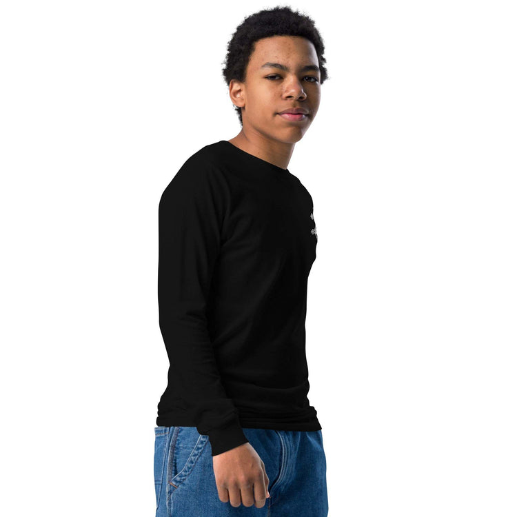 Youth long sleeve tee made of soft Airlume cotton with ribbed cuffs and classic crew neck worn by youth model