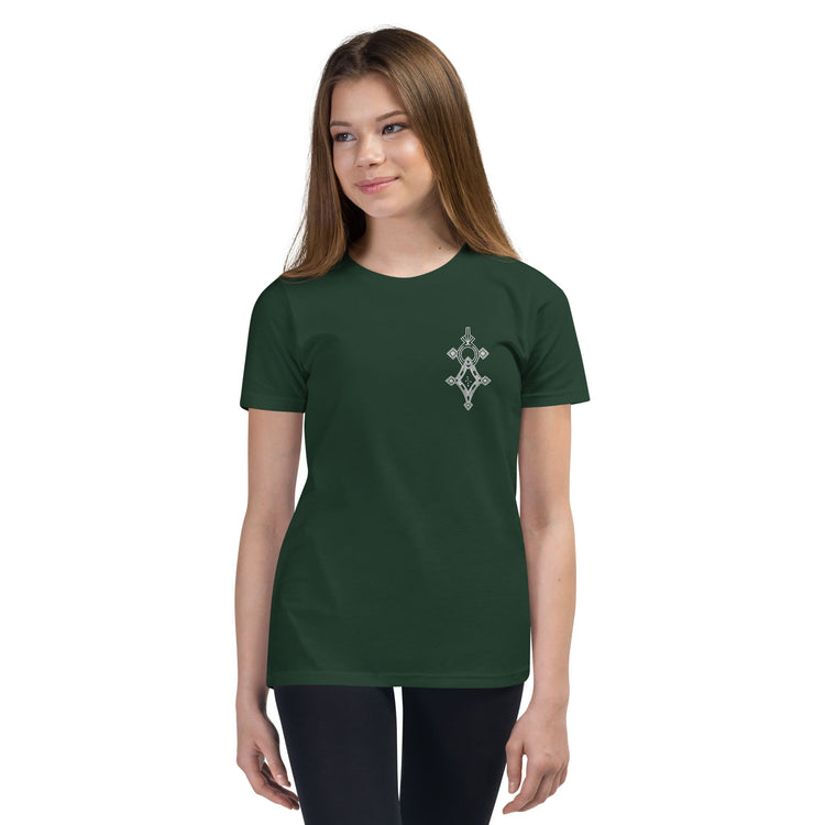 Youth short sleeve t-shirt in dark green with a small front print, worn by a young girl with relaxed unisex fit.